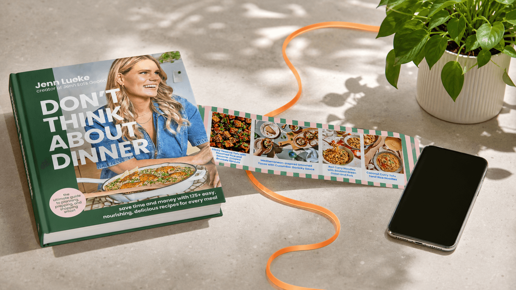 Jenn Lueke's cookbook leading into a recurring weekly meal plan and a meal-planning app on a phone