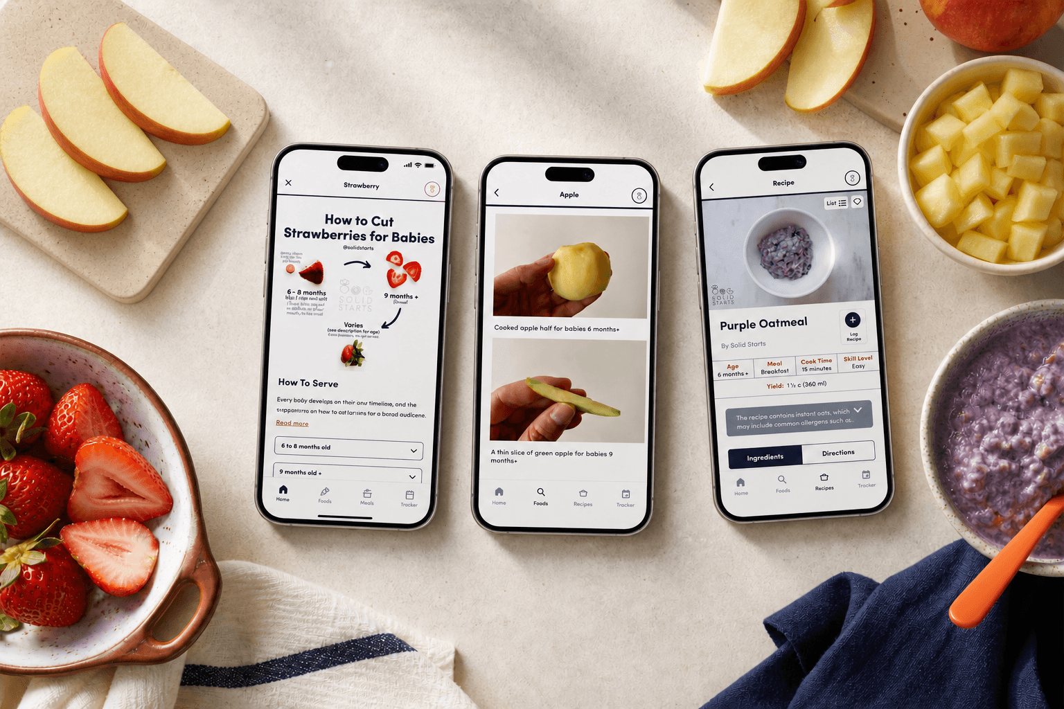 Three large Solid Starts app screens paired with the strawberries, apple, and purple oatmeal they explain how to serve