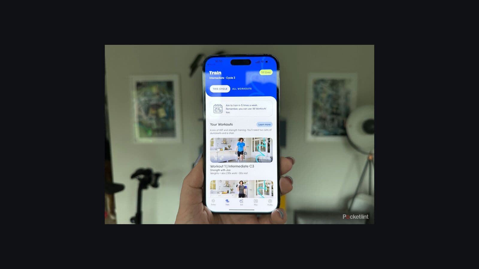 The Body Coach App workout and meal planning screens displayed on mobile phones