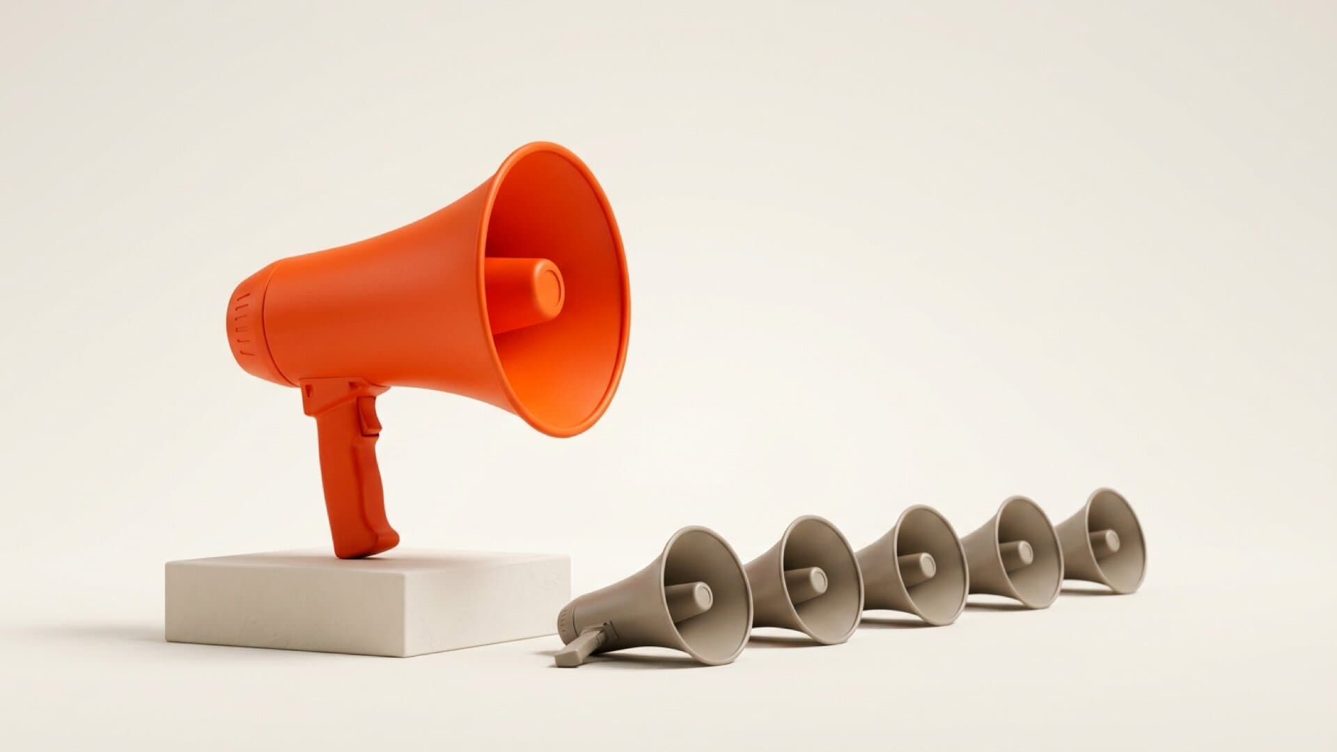 A bright studio scene showing an orange megaphone on a pedestal beside a row of small identical grey megaphones, one voice separated from the noise